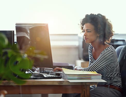 Woman working at a computer