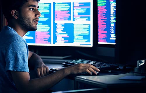 Cybersecurity expert working at home on ransomeware detection