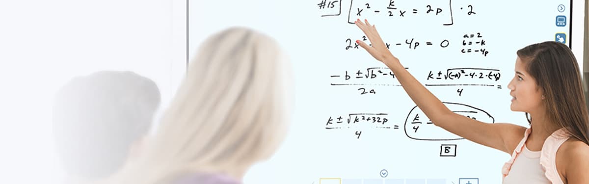 Young student using Interactive Whiteboard